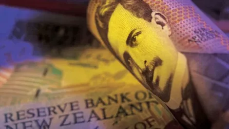 NZ dollar holds near parity with Australian dollar, may breach if RBA cuts rate